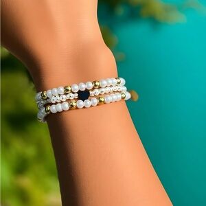 Elegant Gold and White Beaded Bracelet